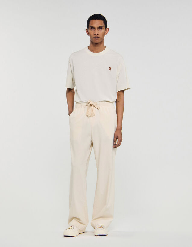 Wide-Leg Elasticated Cotton Trousers - SHPPA01649 | sandro-paris.com Wide-Leg Elasticated Cotton Trousers : Pants & Shorts color Butter cream