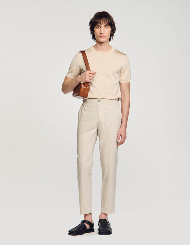 Cotton Carrot-Cut Trousers - SHPPA01420 | sandro-paris.com Cotton Carrot-Cut Trousers : Pants & Shorts color Black