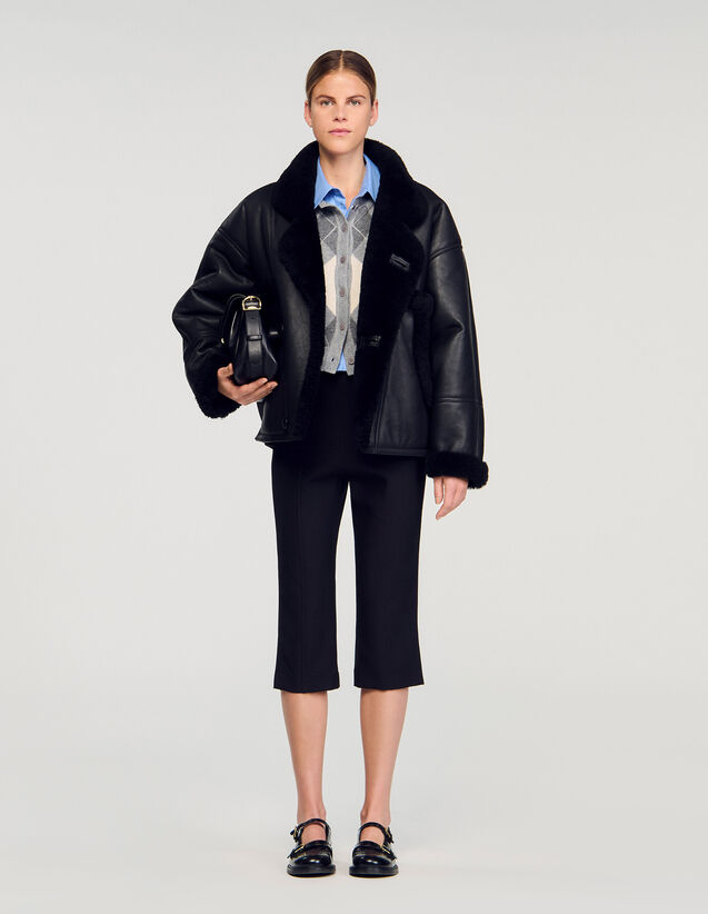 Short Shearling Coat - SFPOU00737 | sandro-paris.com Short Shearling Coat : Coats color Black
