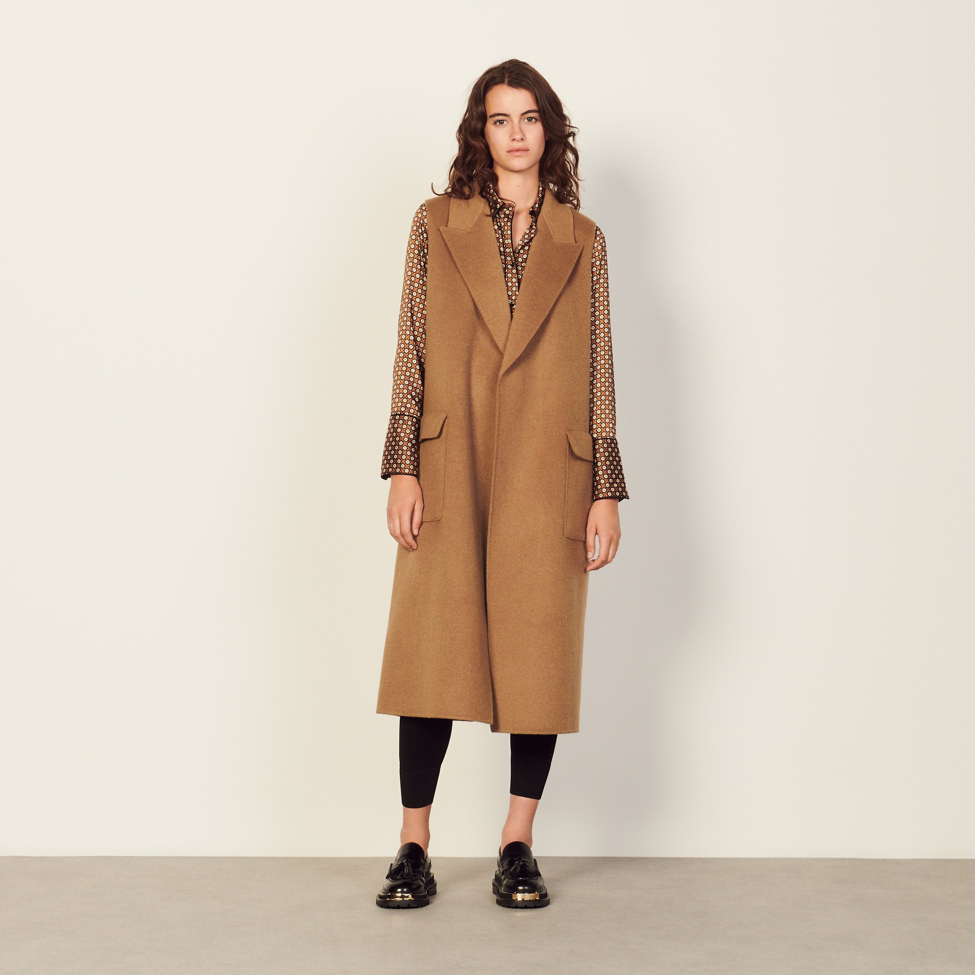sleeveless wool coat