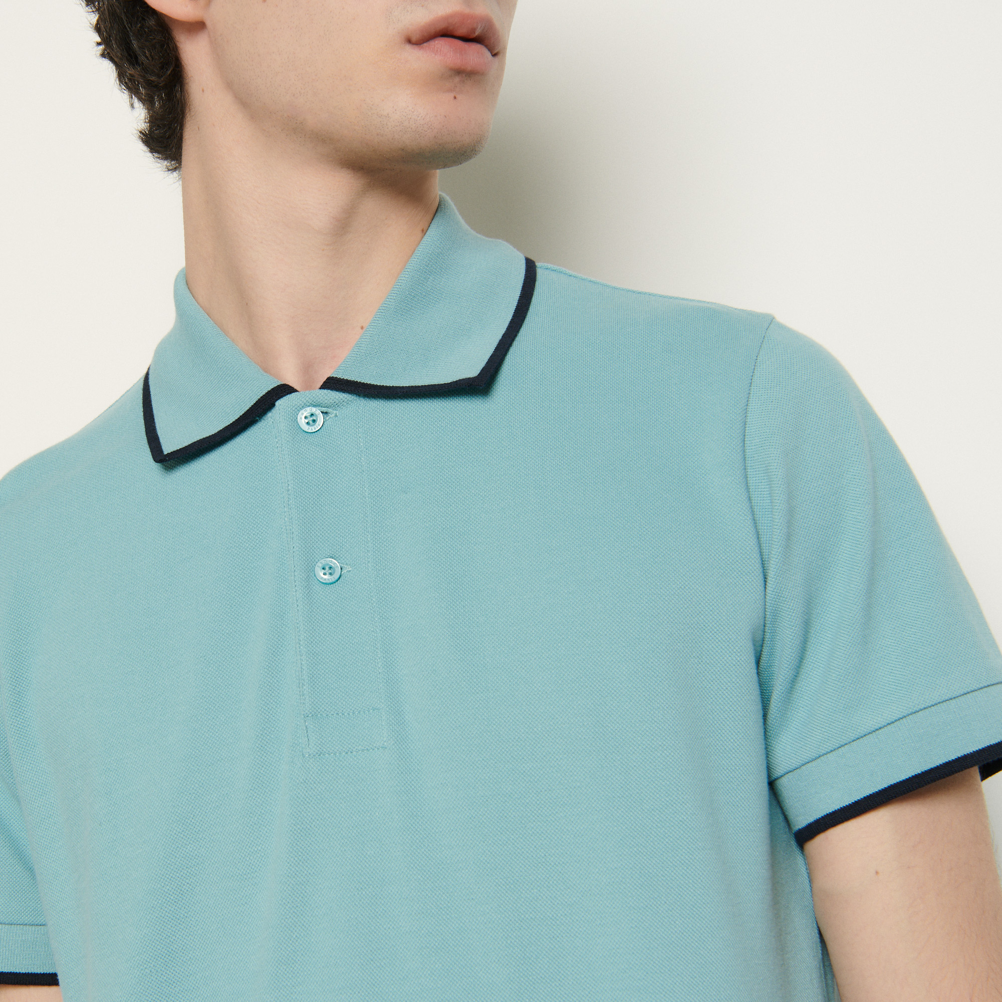 aqua polo shirt